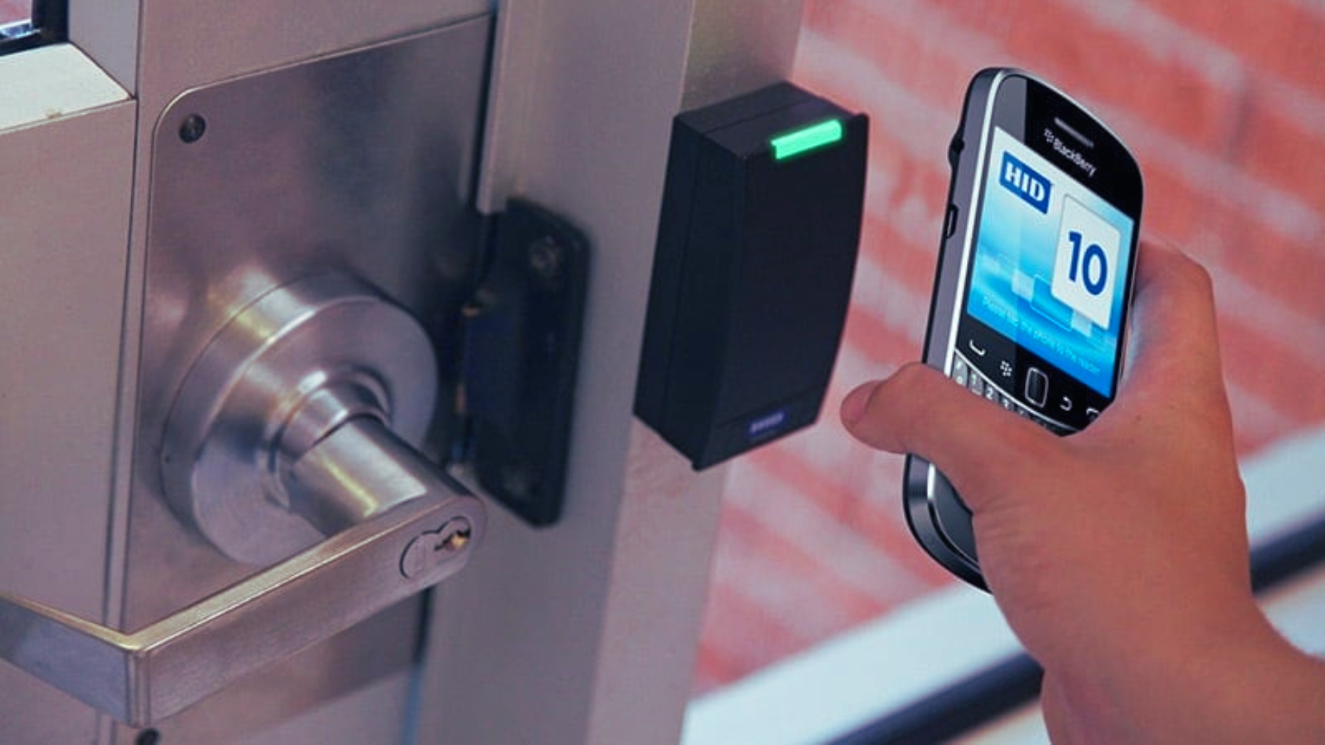 A user unlocking a high-security lock using the smartphone