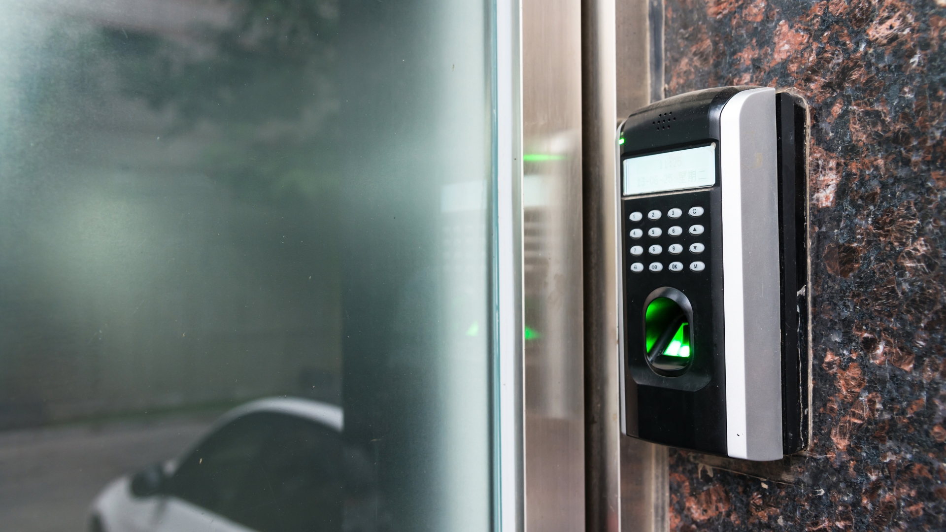 High-security lock upgrade installed at a building's entrance.