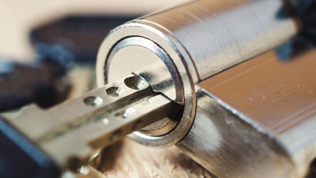 Key inserted into a rekeyed lock cylinder showing an example of a sticking lock after rekey